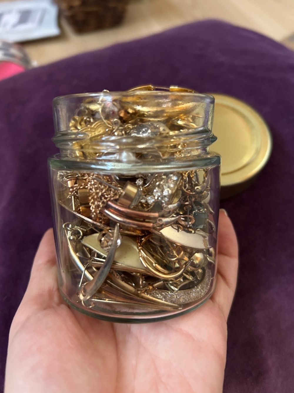 Mystery jewelry jar of gold toned earrings